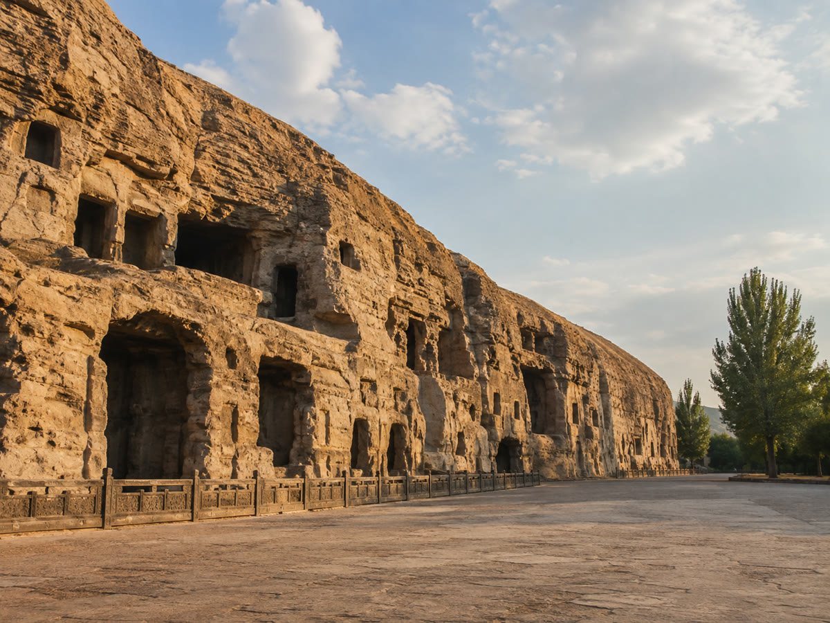 Weathered sandstone caves and carved cliff faces at the Yungang Grottoes near Datong