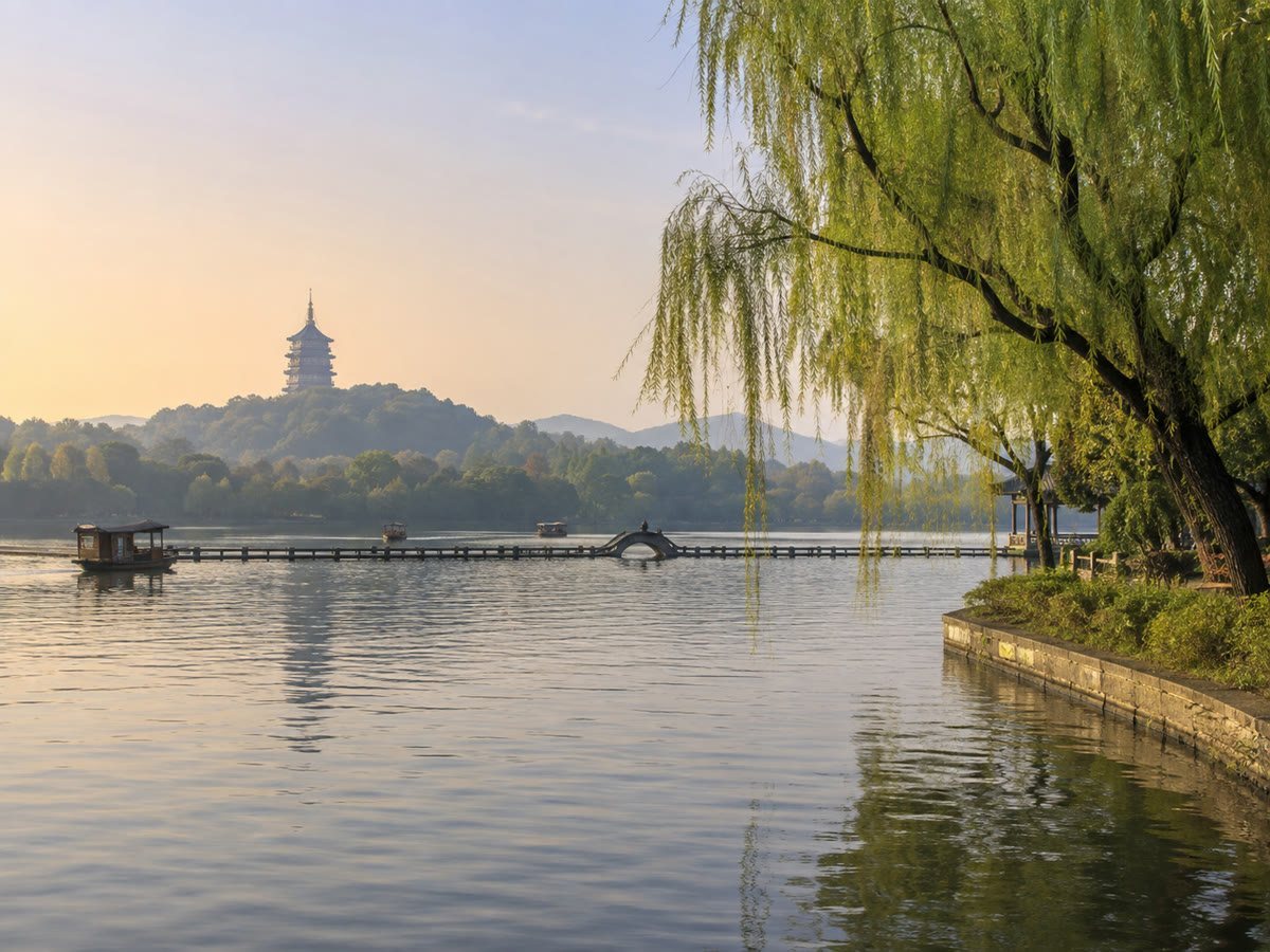 West Lake with willow-lined shores and Leifeng Pagoda in Hangzhou