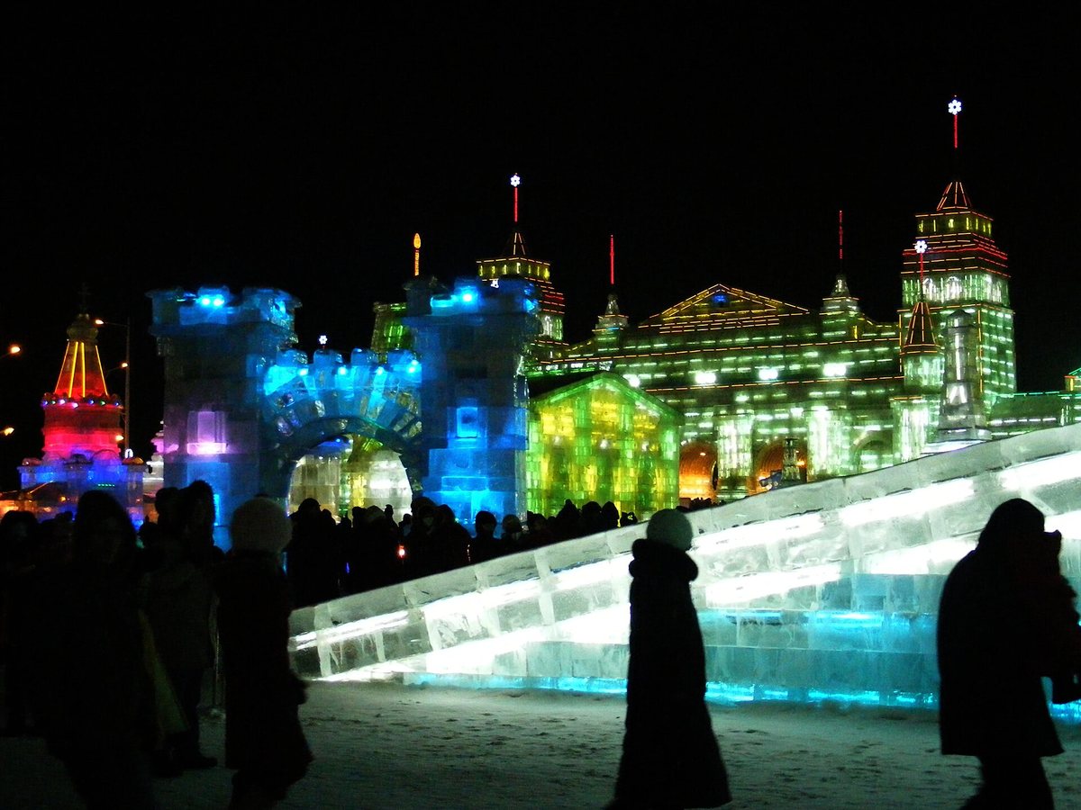 Illuminated ice architecture at Harbin Ice and Snow World at night