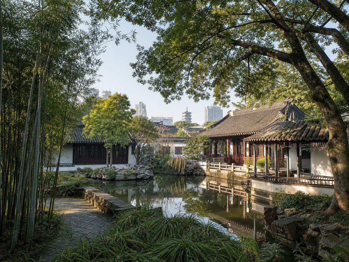 The pond, bamboo and dark-tiled library buildings of Tianyi Pavilion in Ningbo