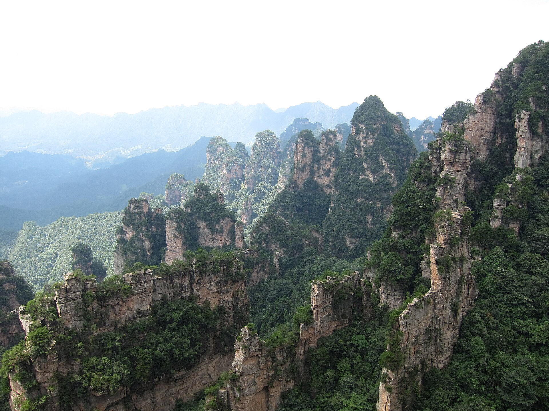 Forested quartz-sandstone pillars at Yuanjiajie in the Wulingyuan scenic area in August 2016.